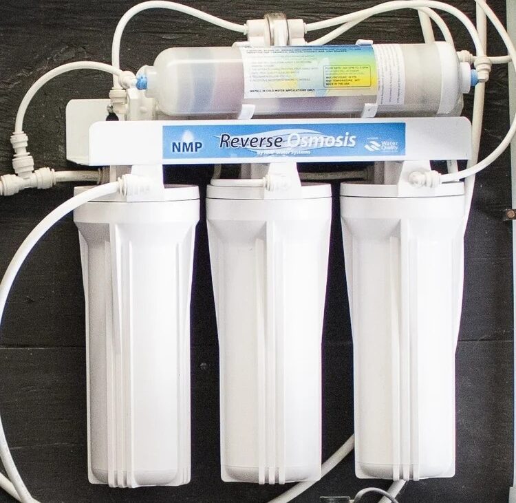 Reverse Osmosis filters mounted on wall