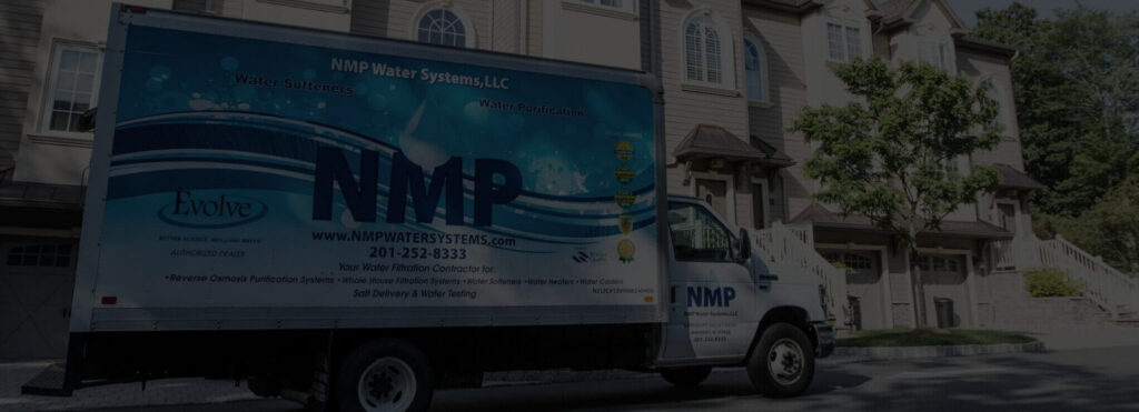 NMP Water Systems truck in front of new jersey homes